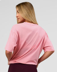 Woman wearing VS1 Enjoy The Journey FLXCotton Oversize Tee - Pink Rose | Model:Issy | Size:XS | Thumbnail Index: 5