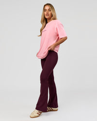 Woman wearing VS1 Enjoy The Journey FLXCotton Oversize Tee - Pink Rose | Model:Issy | Size:XS | Thumbnail Index: 8