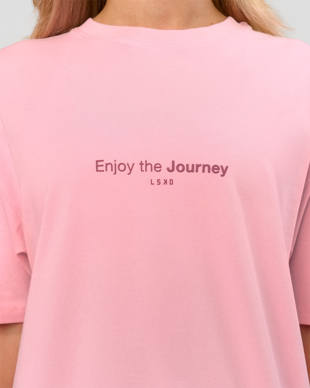 Woman wearing VS1 Enjoy The Journey FLXCotton Oversize Tee - Pink Rose | Model:Issy | Size:XS - view 13