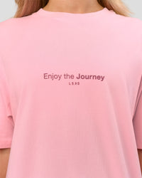Woman wearing VS1 Enjoy The Journey FLXCotton Oversize Tee - Pink Rose | Model:Issy | Size:XS | Thumbnail Index: 12