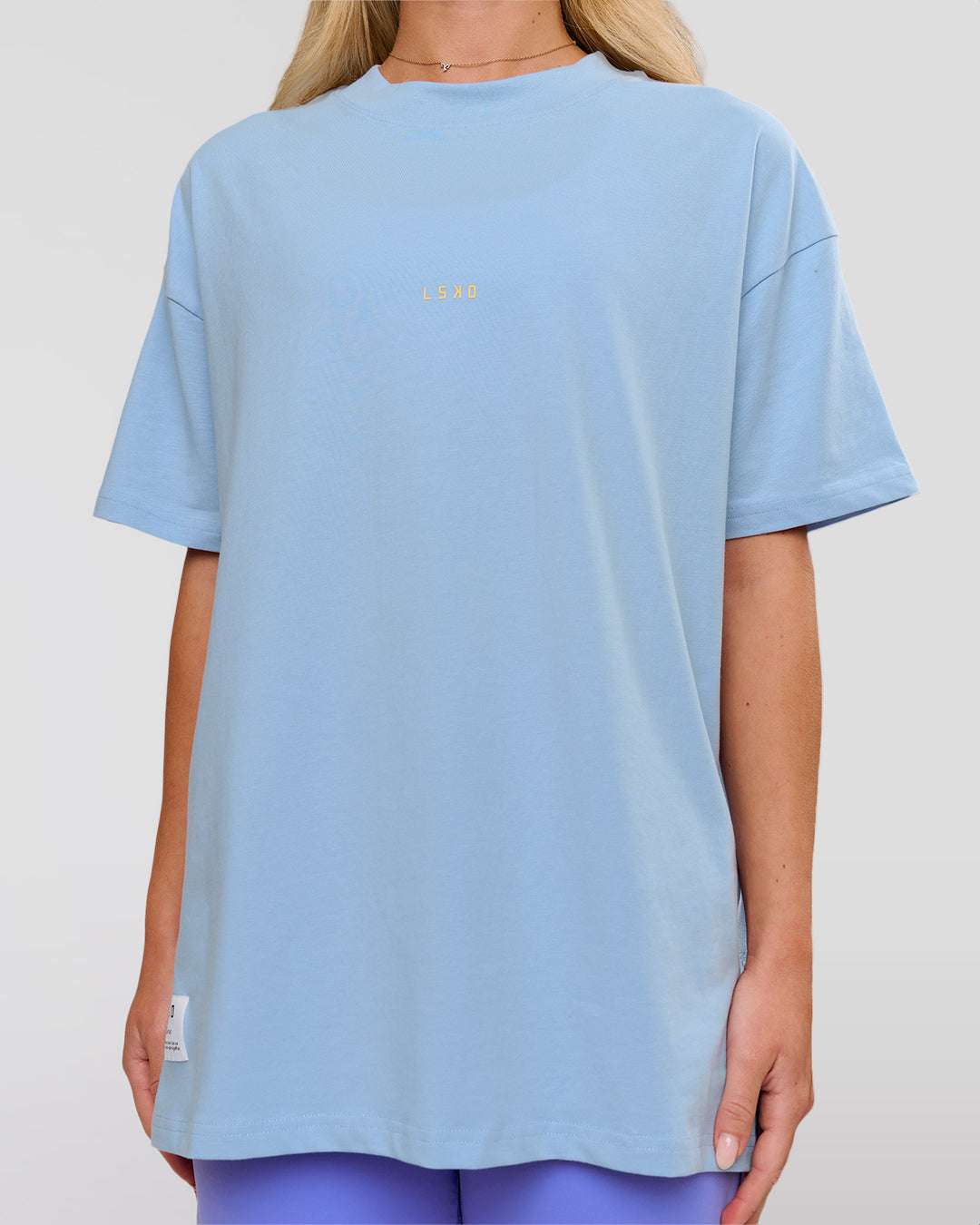 Woman wearing VS26 Journey FLXCotton Oversize Tee - Open Air-Lemon | Model:Issy | Size:XS - view 8