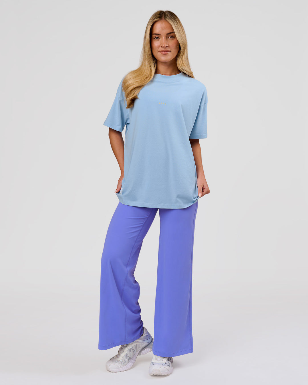 Woman wearing VS26 Journey FLXCotton Oversize Tee - Open Air-Lemon | Model:Issy | Size:XS - view 10