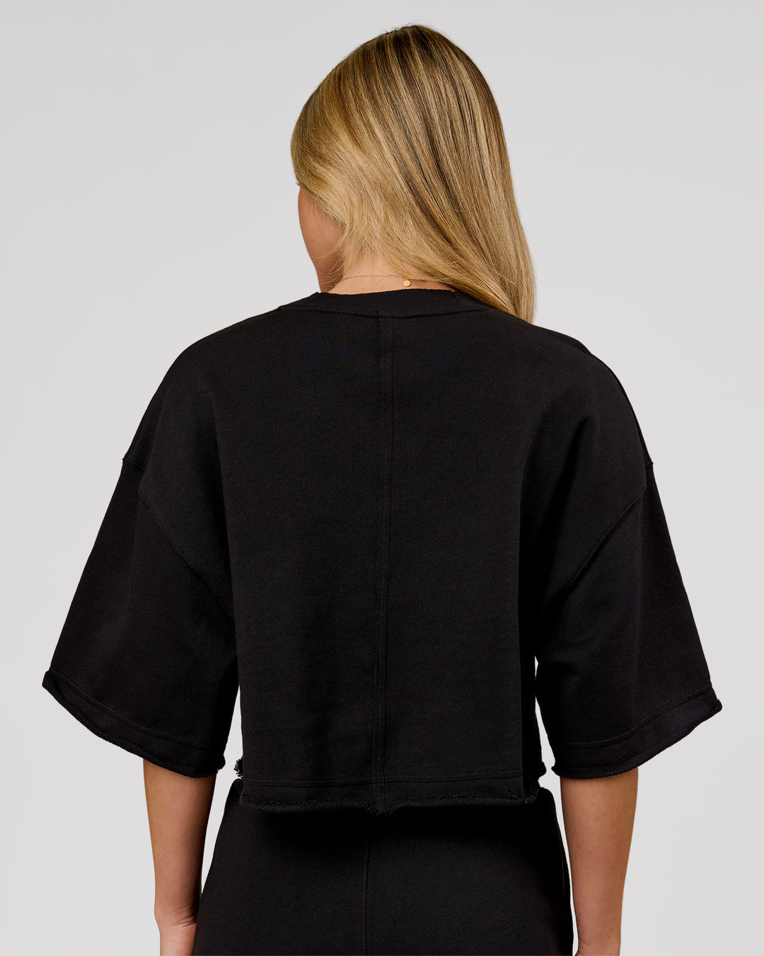Woman wearing Go-To Terry Oversized Tee - Black | Model:Issy | Size:XS - view 4