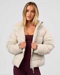 Woman wearing Go-To Puffer Jacket - Shale Beige | Model:Izzy | Size:XS