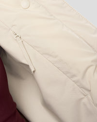 Woman wearing Go-To Puffer Jacket - Shale Beige | Model:Izzy | Size:XS