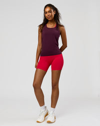 Woman wearing AeroFLX+ Seamless Tank - Cherry Lacquer/Cherry Lacquer | Model:Jordan | Size:XS | Thumbnail Index: 3