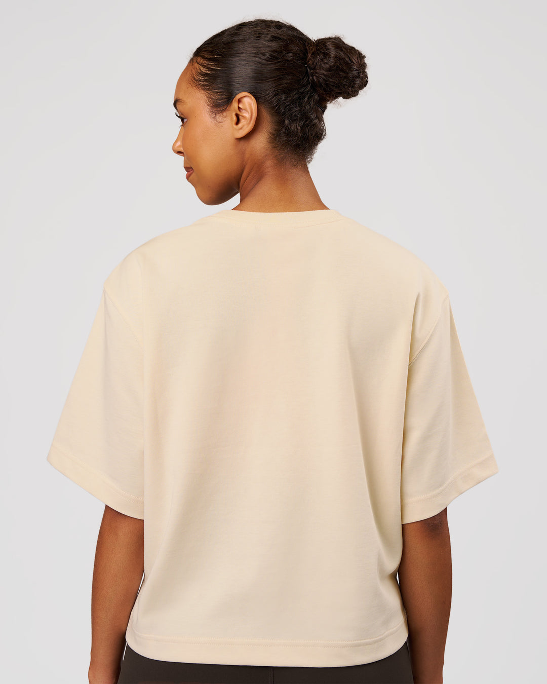 Woman wearing AfterDark ZeroCrease Cropped Tee - Vanilla Bean | Model:Jordan | Size:XS - view 3