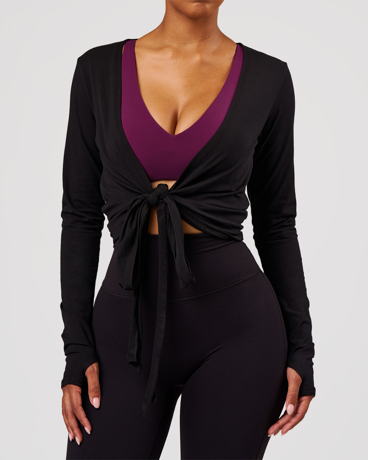 Woman wearing All Day Wrap FLXCotton Long Sleeve Top - Black | Model:Jordan | Size:XS