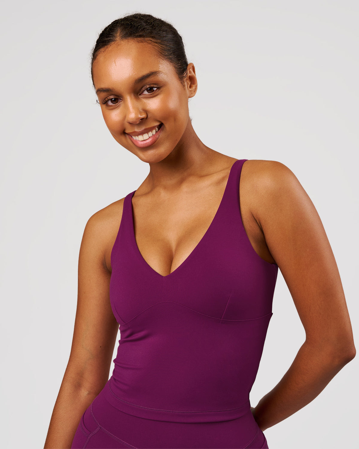Woman wearing Vitality Active Tank - Plum Caspia | Model:Jordan | Size:XS