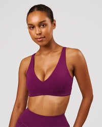 Woman wearing Vitality Sports Bra - Plum Caspia | Model:Jordan | Size:XS | Thumbnail Index: 2