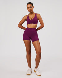 Woman wearing Vitality Sports Bra - Plum Caspia | Model:Jordan | Size:XS | Thumbnail Index: 5