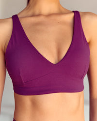 Woman wearing Vitality Sports Bra - Plum Caspia | Model:Kenni | Size:XS | Thumbnail Index: 3