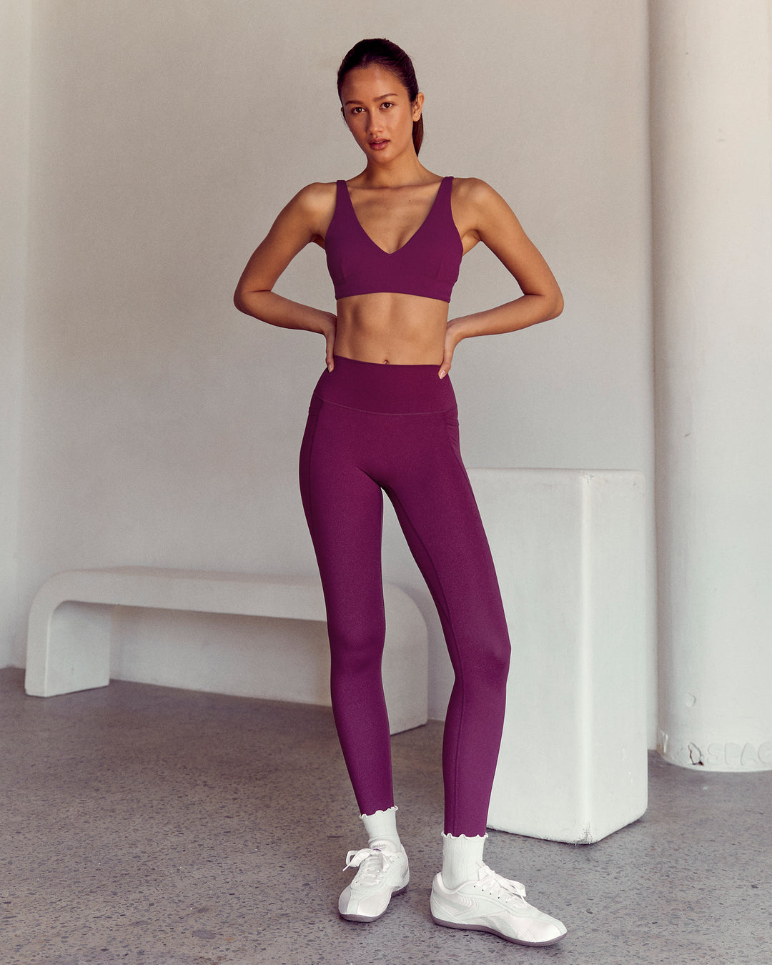 Woman wearing Vitality Sports Bra - Plum Caspia | Model:Kenni | Size:XS - view 5