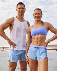 Woman wearing Accelerate 3" Mid-Rise Running Short - Bluebell-Open Air | Model:Maja | Size:XS | Thumbnail Index: 15