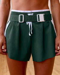 Woman wearing Trackline Accelerate 3" High-Rise Running Short - Midnight Green-White | Model:Meg | Size:XS | Thumbnail Index: 7