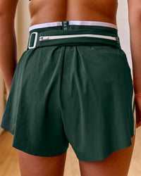 Woman wearing Trackline Accelerate 3" High-Rise Running Short - Midnight Green-White | Model:Meg | Size:XS | Thumbnail Index: 9