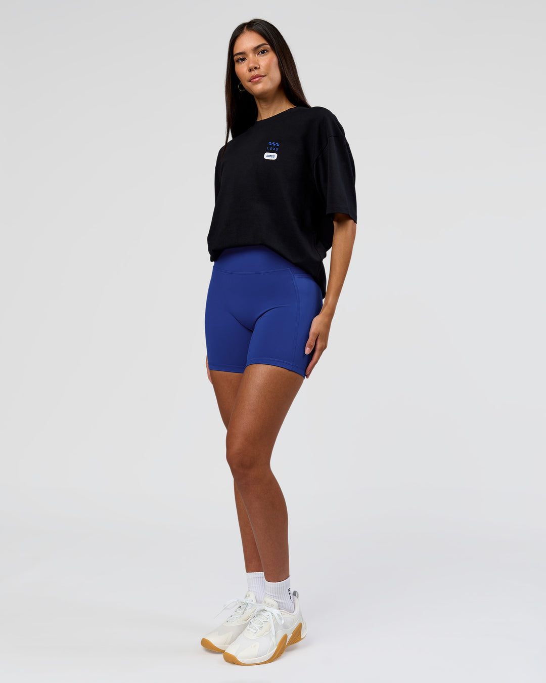 Woman wearing Archive FLXCotton Oversized Tee - Black-Electric Indigo | Model:Rhiley | Size:XS - view 11