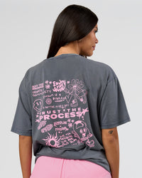 Woman wearing Built On Values FLXCotton Oversized Tee - Dark Storm Washed-Pink Rose | Model:Rhiley | Size:XS | Thumbnail Index: 1