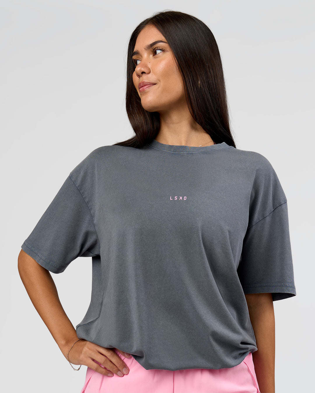 Woman wearing Built On Values FLXCotton Oversized Tee - Dark Storm Washed-Pink Rose | Model:Rhiley | Size:XS - view 12