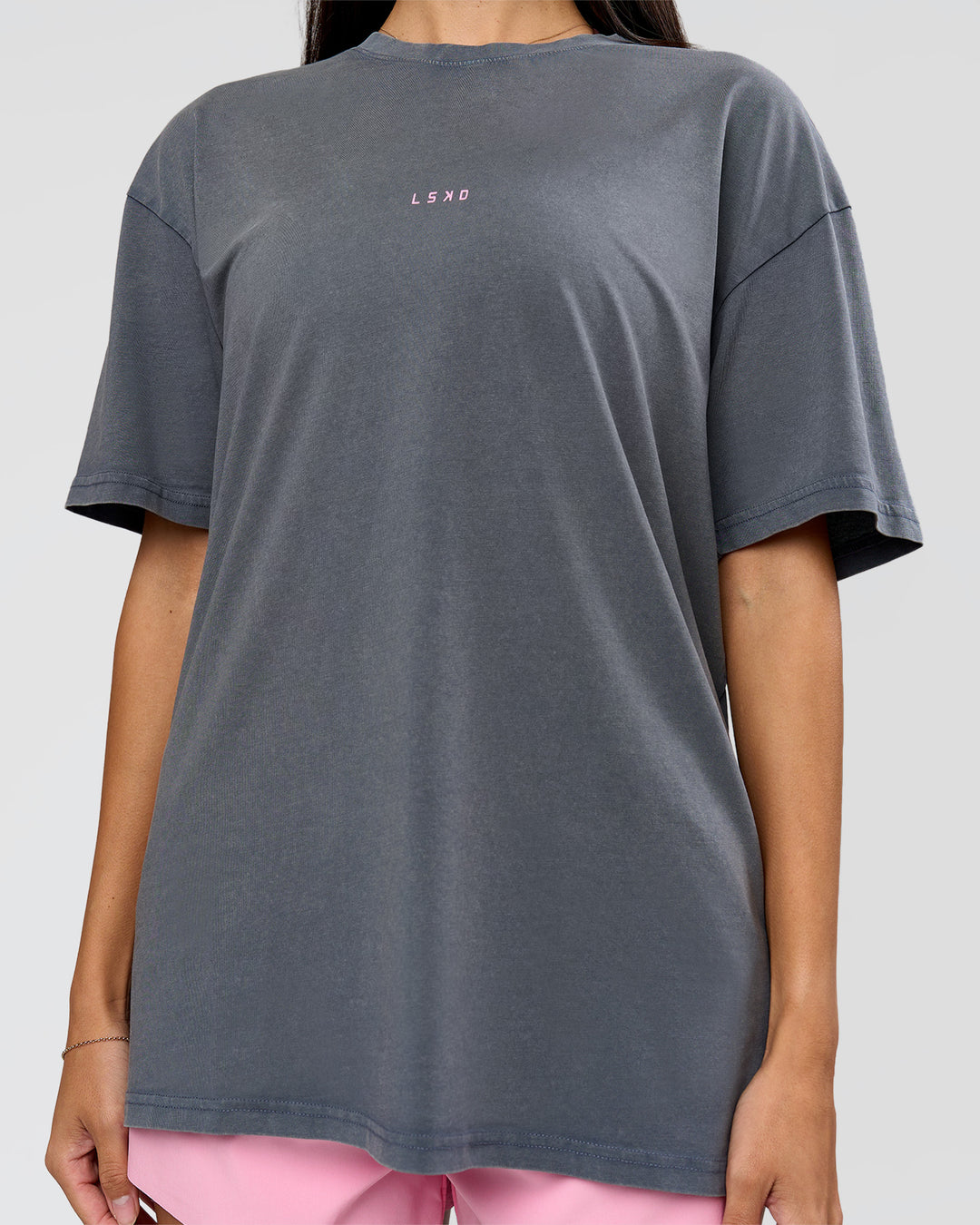 Woman wearing Built On Values FLXCotton Oversized Tee - Dark Storm Washed-Pink Rose | Model:Rhiley | Size:XS - view 13