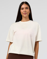 Woman wearing Built On Values FLXCotton Oversized Tee - Off White-Pink Rose | Model:Rhiley | Size:XS | Thumbnail Index: 12