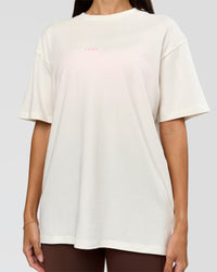 Woman wearing Built On Values FLXCotton Oversized Tee - Off White-Pink Rose | Model:Rhiley | Size:XS | Thumbnail Index: 13