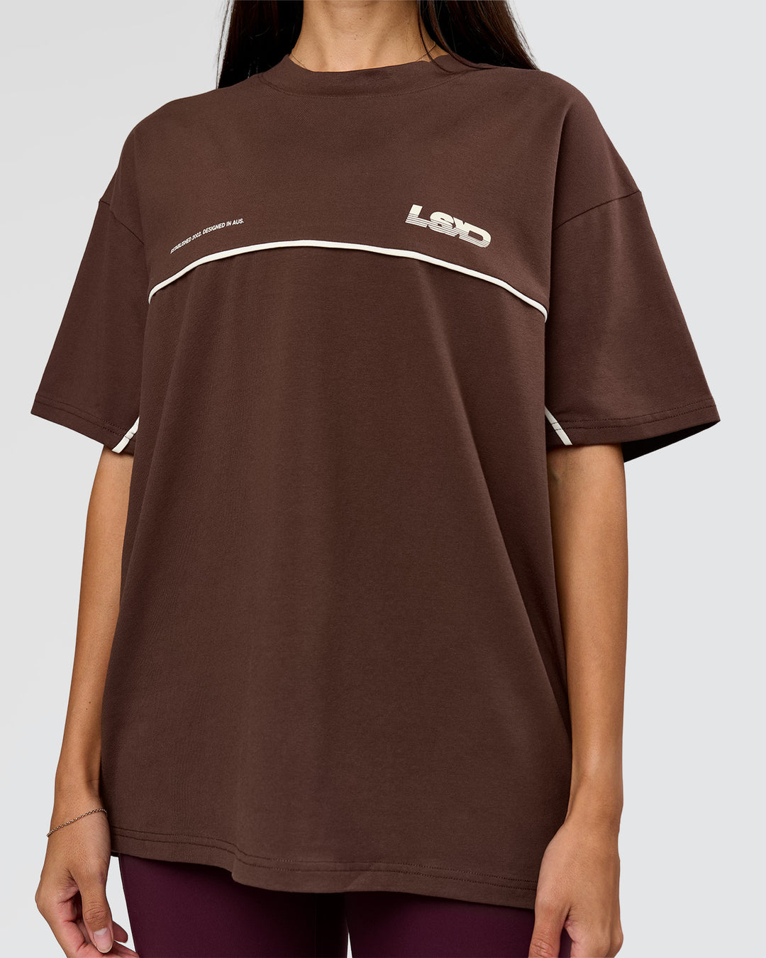 Woman wearing Inline Heavyweight FLXCotton Oversized Tee - Hot Chocolate-Off White | Model:Rhiley | Size:XS - view 10