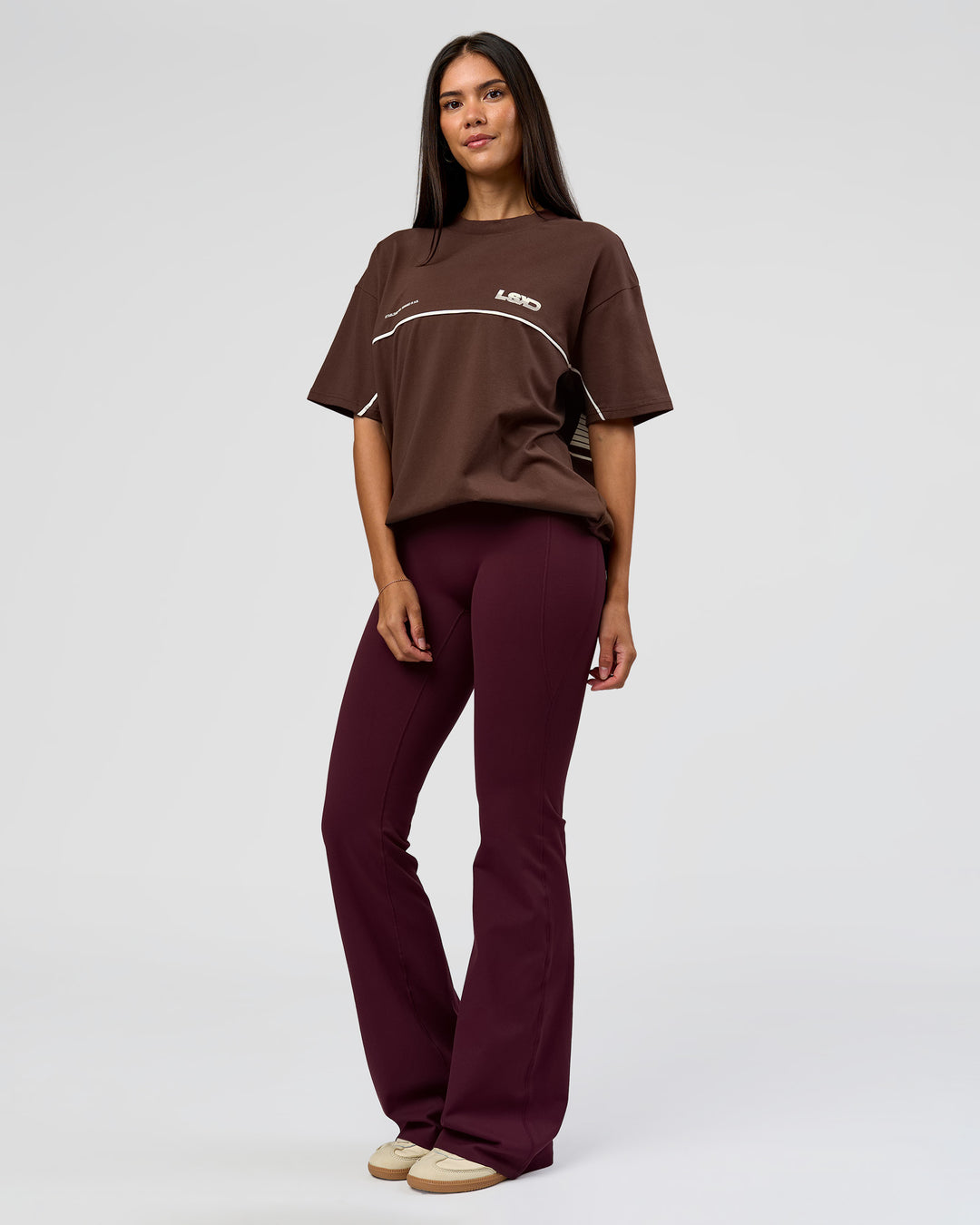 Woman wearing Inline Heavyweight FLXCotton Oversized Tee - Hot Chocolate-Off White | Model:Rhiley | Size:XS - view 15