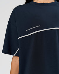 Woman wearing Inline Heavyweight FLXCotton Oversized Tee - Midnight Navy-White | Model:Rhiley | Size:XS | Thumbnail Index: 16