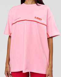 Woman wearing Inline Heavyweight FLXCotton Oversized Tee - Pink Rose-Flame | Model:Rhiley | Size:XS | Thumbnail Index: 20