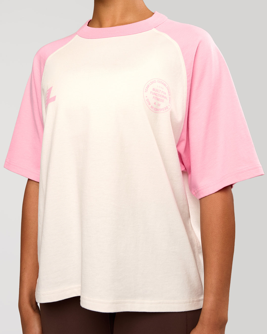 Woman wearing Victory Heavyweight Boxed Raglan Tee - Off White-Pink Rose | Model:Rosie | Size:XS - view 6