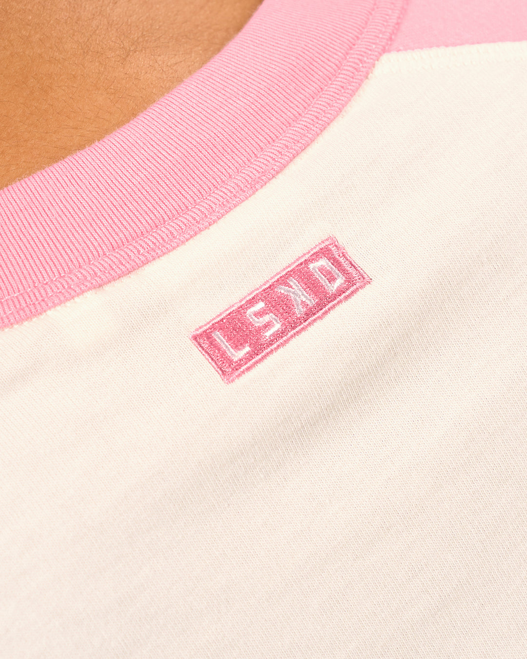 Woman wearing Victory Heavyweight Boxed Raglan Tee - Off White-Pink Rose | Model:Rosie | Size:XS - view 10