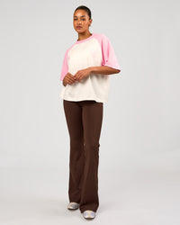 Woman wearing Victory Heavyweight Boxed Raglan Tee - Off White-Pink Rose | Model:Rosie | Size:XS | Thumbnail Index: 11