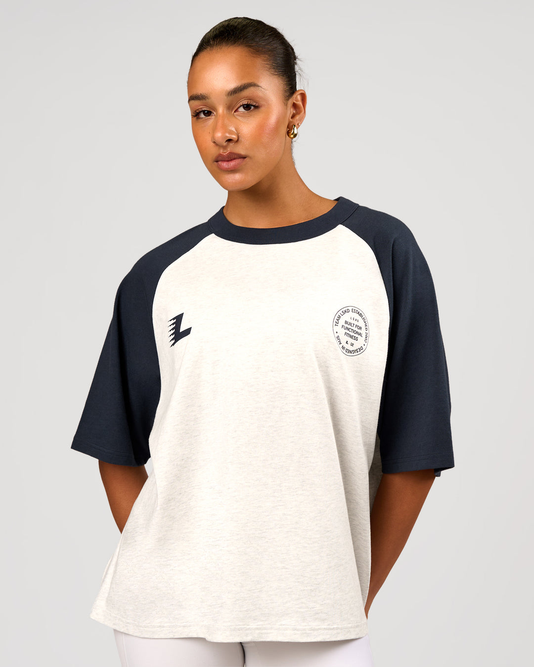 Woman wearing Victory Heavyweight Boxed Raglan Tee - Silver Marl-Midnight Navy | Model:Rosie | Size:XS - view 3