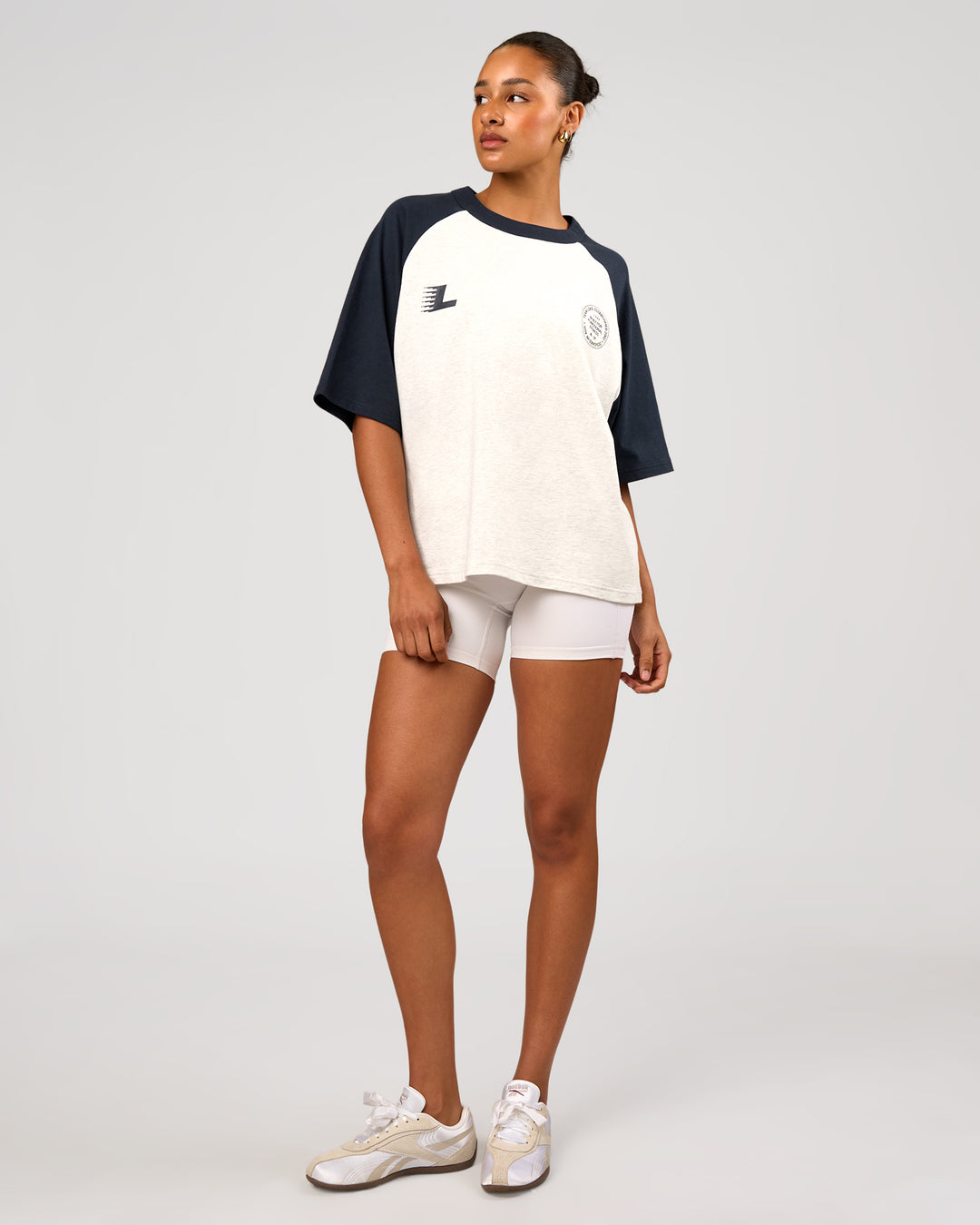 Woman wearing Victory Heavyweight Boxed Raglan Tee - Silver Marl-Midnight Navy | Model:Rosie | Size:XS - view 9