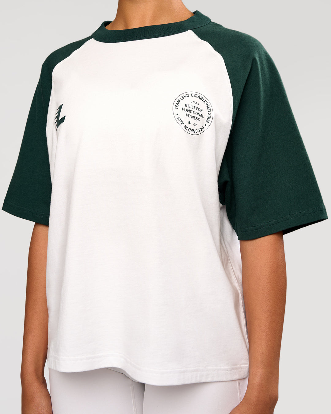 Woman wearing Victory Heavyweight Boxed Raglan Tee - White-Midnight Green | Model:Rosie | Size:XS - view 9
