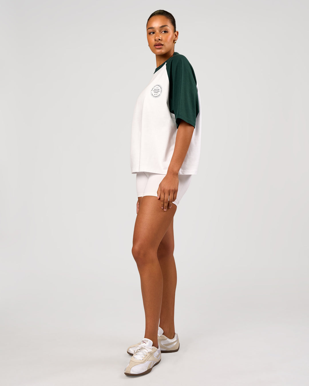 Woman wearing Victory Heavyweight Boxed Raglan Tee - White-Midnight Green | Model:Rosie | Size:XS - view 11