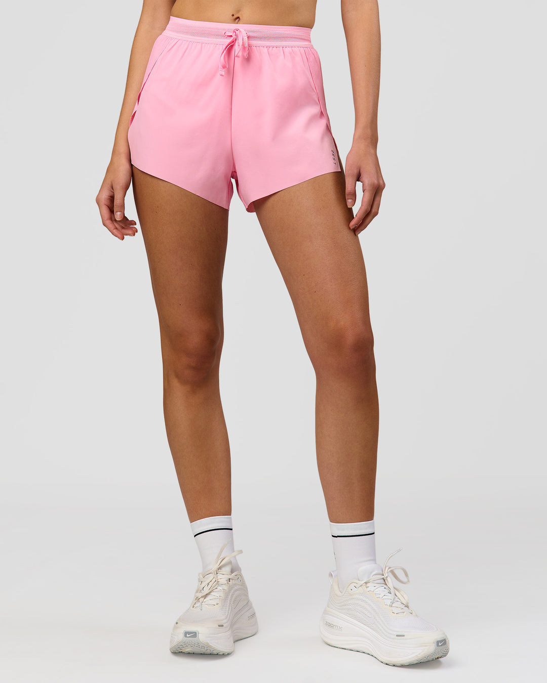 Woman wearing Accelerate 3" High-Rise Running Short - Pink Rose | Model:Taneisha | Size:XS
