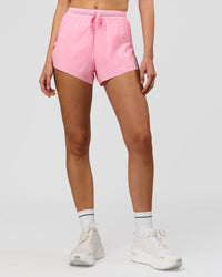 Woman wearing Accelerate 3" High-Rise Running Short - Pink Rose | Model:Taneisha | Size:XS