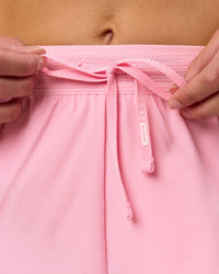 Woman wearing Accelerate 3" High-Rise Running Short - Pink Rose | Model:Taneisha | Size:XS
