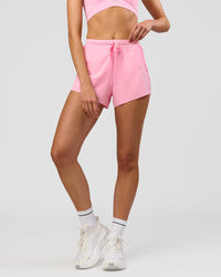 Woman wearing Accelerate 3" High-Rise Running Short - Pink Rose | Model:Taneisha | Size:XS