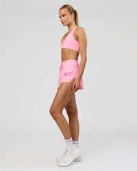 Woman wearing Accelerate 3" High-Rise Running Short - Pink Rose | Model:Taneisha | Size:XS