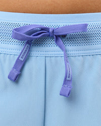 Woman wearing Accelerate 3" Mid-Rise Running Short - Bluebell-Open Air | Model:Taneisha | Size:XS | Thumbnail Index: 11