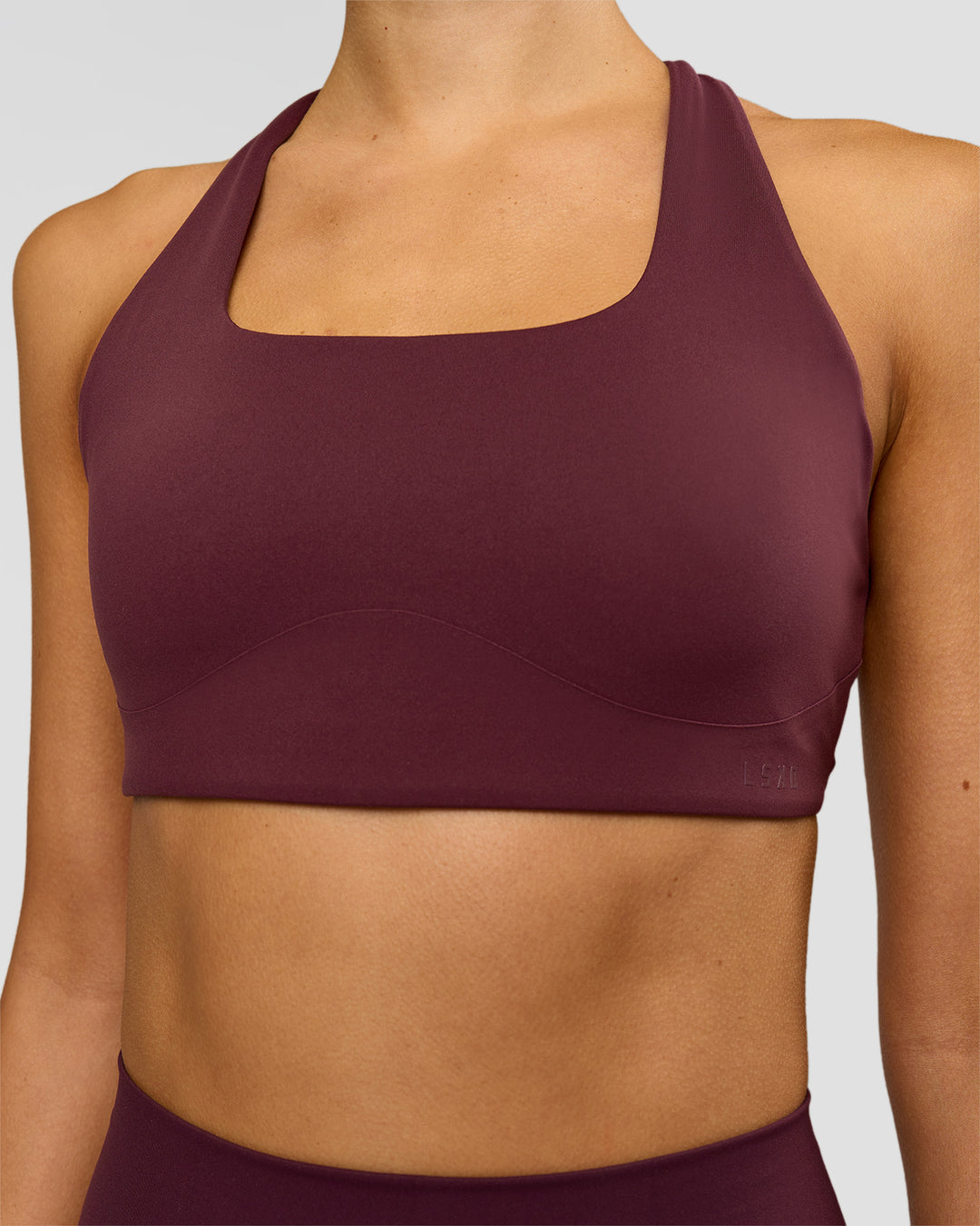Woman wearing Aspire Sports Bra - Cherry Lacquer | Model:Taneisha | Size:XS - view 3