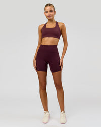 Woman wearing Aspire Sports Bra - Cherry Lacquer | Model:Taneisha | Size:XS | Thumbnail Index: 3