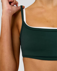 Woman wearing Balance Sports Bra - Midnight Green-White | Model:Taneisha | Size:XS | Thumbnail Index: 4