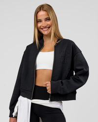 Woman wearing Bomber ZeroCrease Spacer Jacket - Black | Model:Taneisha | Size:XS | Thumbnail Index: 4