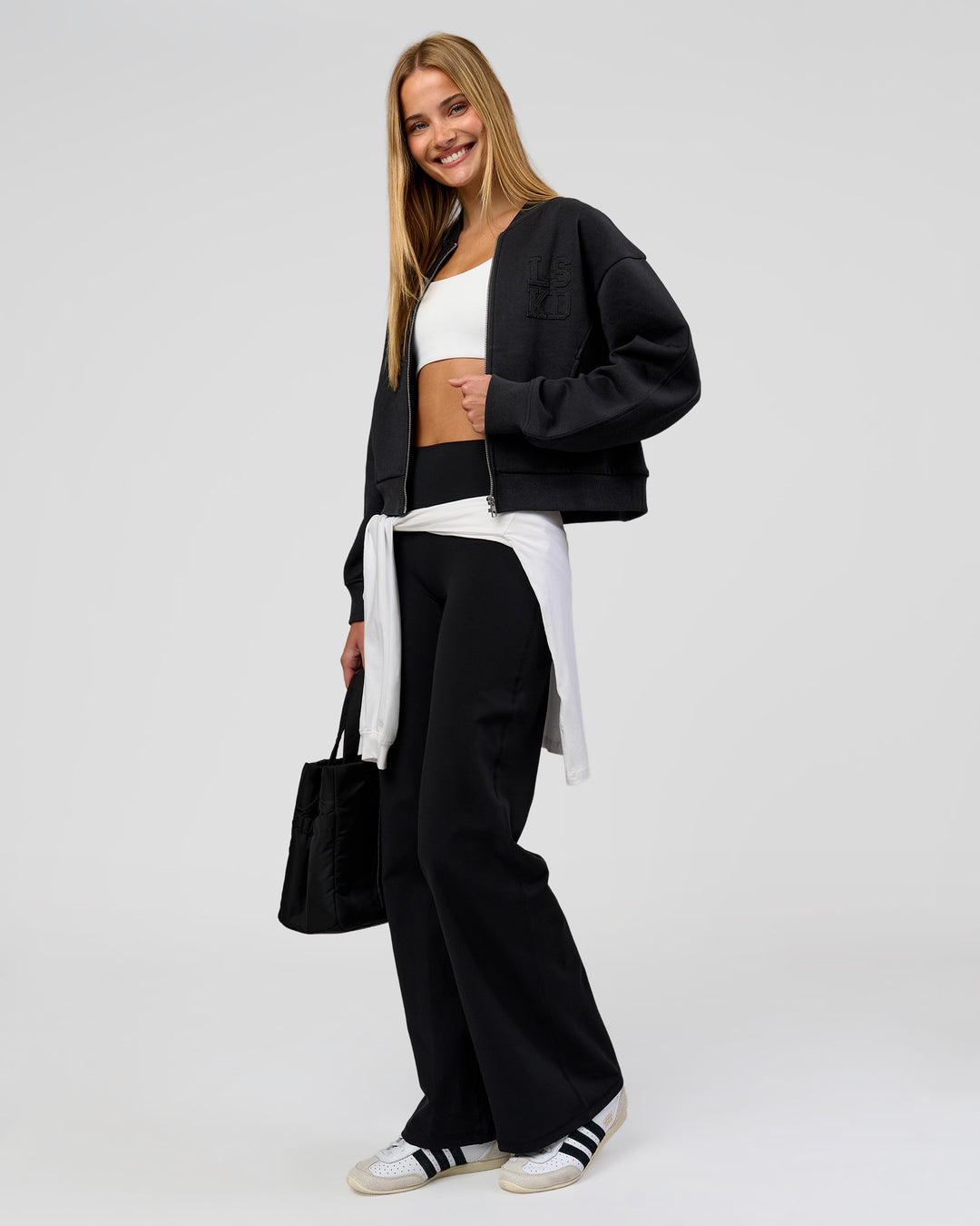 Woman wearing Bomber ZeroCrease Spacer Jacket - Black | Model:Taneisha | Size:XS - view 7