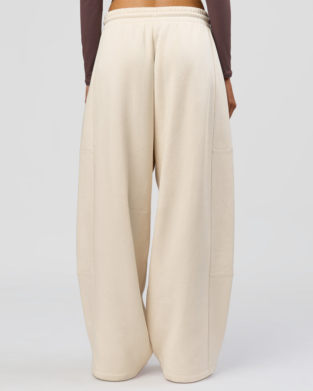 Woman wearing Bree Barrel Fleece Track Pant - Vanilla Bean | Model:Taneisha | Size:XS - view 5