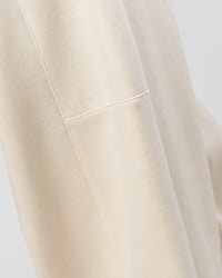 Woman wearing Bree Barrel Fleece Track Pant - Vanilla Bean | Model:Taneisha | Size:XS | Thumbnail Index: 10